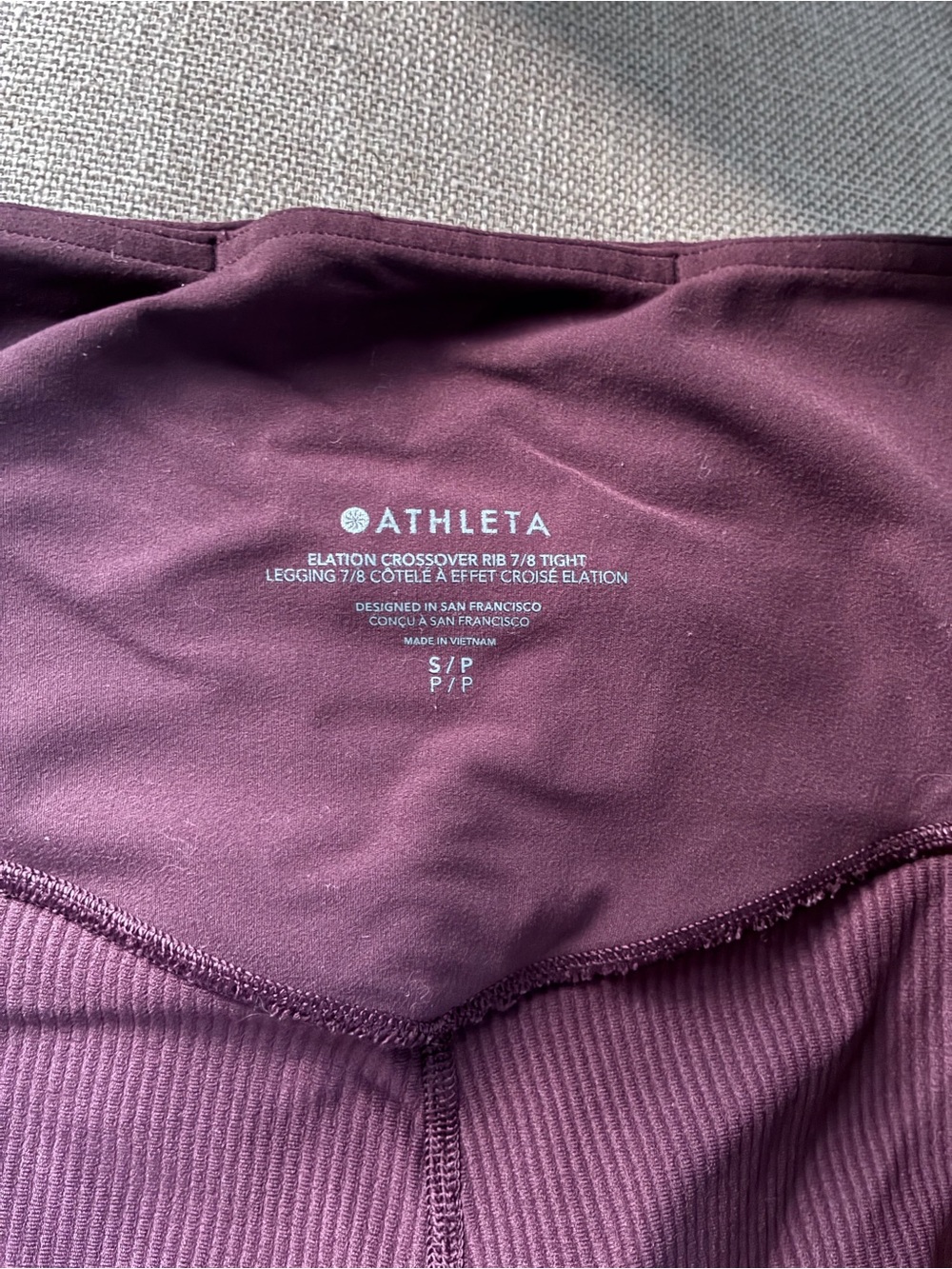 Athleta Elation Crossover Rib 7/8 Leggings in Deep Plum